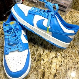 Never worn, men’s Nike “university blue”